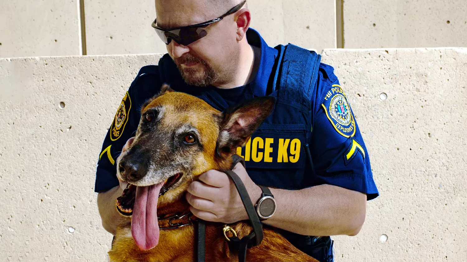 An FBI police officer with a police dog
